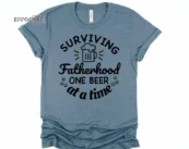 Surviving Fatherhood One Beer at a Time Shirt Funny Dad