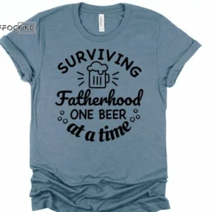 Surviving Fatherhood One Beer at a Time Shirt Funny Dad